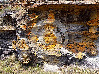 the Different minerals color the rock, the landscape in Antsirabe, the wild nature of Madagascar Stock Photo