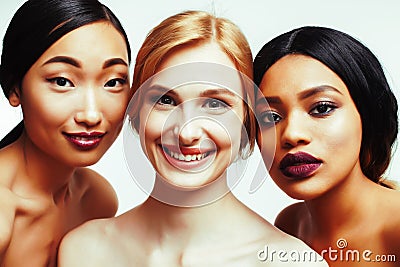 different nation woman: asian, african-american, caucasian toget Stock Photo