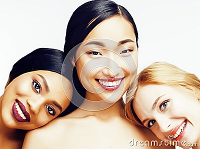 Different nation woman: asian, african-american, caucasian together isolated on white background happy smiling, diverse Stock Photo