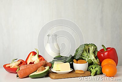 Different natural food rich in vitamin A on table Stock Photo