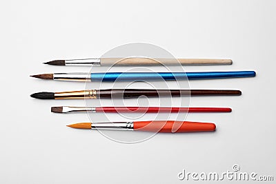 Different paint brushes on white background Stock Photo