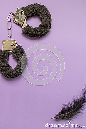 Different sex toys are on a purple background. Idea for sex shop advertising. Adult content Stock Photo