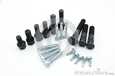 Different sized automotive bolt with dowel pins or drill point wood screws and measurements on a white background Stock Photo