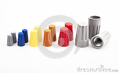 Different sizes and colors of Wire nut connectors on white background , Tool for connecting electrical wires Stock Photo