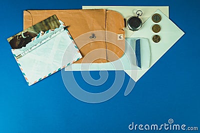Different stuff to send a post mail like papers, envelope, pens and other objects. Copy space Stock Photo