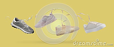 Different stylish sneakers in air on yellow background, collage design Stock Photo