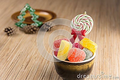 Different sweet candies on rustic wooden table Stock Photo