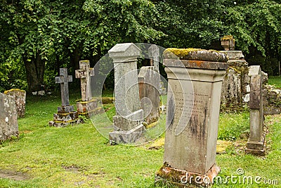 Tombs and craves in a scotish church cemetery Editorial Stock Photo