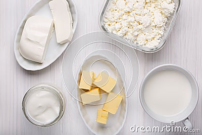 Different type of dairy products on white wooden background Stock Photo