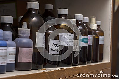 Different types of bottles of solutions for laboratory tests with selective focus Stock Photo