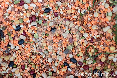 Different types of legumes. Chickpeas, red lentils, yellow peas Stock Photo