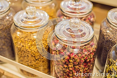 Different types of tea in glass jars Stock Photo