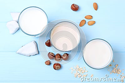 Different types of vegetable milk on the table. Stock Photo