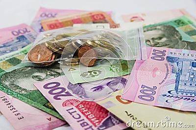 Different Ukrainian hryvnia and coins. Stock Photo
