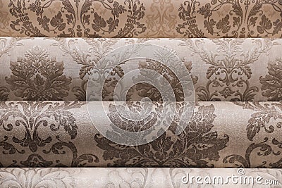 Different wall paper rolls as background, closeup Stock Photo