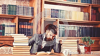 Difficult subject, confusing question, study, education, hard work, intellectual research concept. Man sits at table Stock Photo