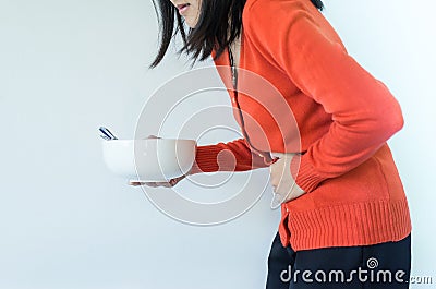 Digestion problems,Woman with stomach pain after eating,Hand female holding her belly Stock Photo