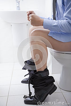 Digestive problems like constipation or diarrhea. Stock Photo