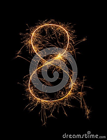 Digit 8 or eight made of bengal fire, sparkler fireworks candle isolated on a black background Stock Photo