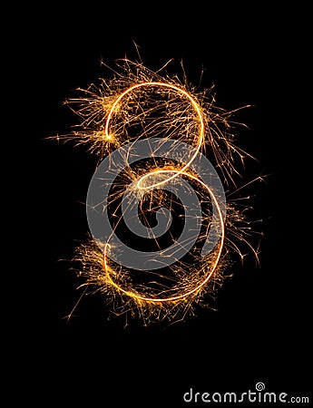 Digit 3 or three made of bengal fire, sparkler fireworks candle isolated on a black background Stock Photo