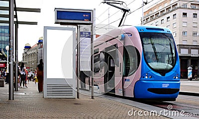 digital ad display at tram stop. blank white lightbox. empty billboard. busstop advertising. Editorial Stock Photo