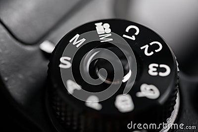 Digital Camera Control Dial Showing Aperture, Shutter Speed, Manual and Program Modes Stock Photo