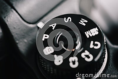 Digital Camera Control Dial Showing Aperture, Shutter Speed, Manual and Program Modes Stock Photo