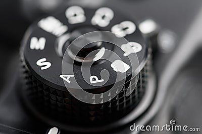 Digital Camera Control Dial Showing Aperture, Shutter Speed, Manual and Program Modes Stock Photo