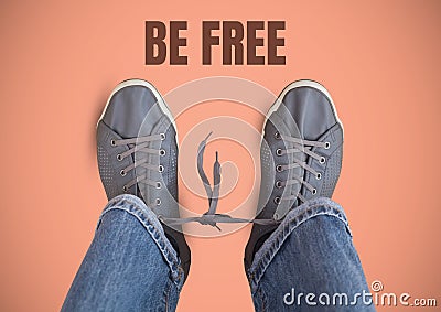 Be free text and Grey shoes on feet with pink background Stock Photo