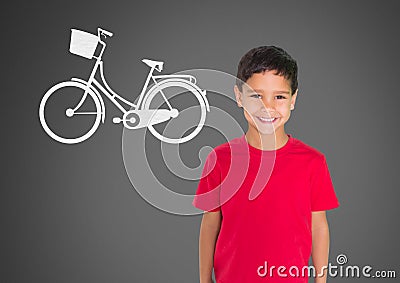Boy against grey background smiling and bicycle Stock Photo