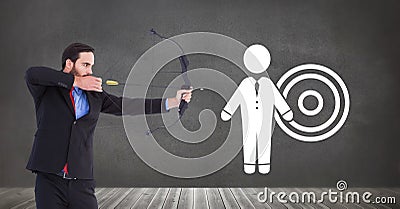 Businessman shooting arrow at target icon Stock Photo