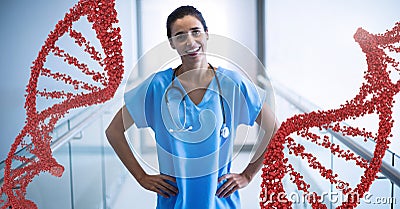 Doctor woman standing with 3D DNA strands Stock Photo