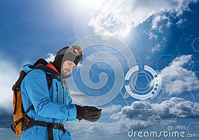 Explorer Man dressed in outdoors gear and clothes with cold sky interface Stock Photo