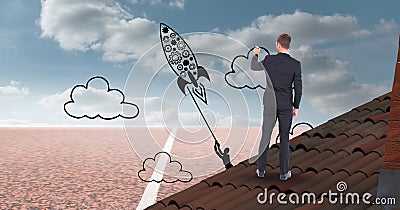 Digital composite image of businessman drawing rocket and clouds on sky Stock Photo