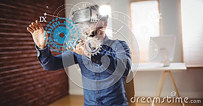 Digital composite image of businessman using VR glasses Stock Photo