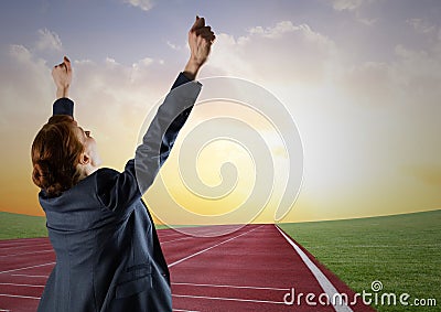 Digital composite image of a businesswoman winning the race Stock Photo