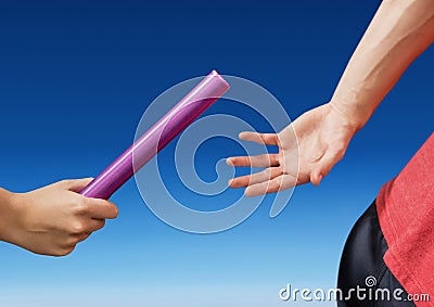 Digital composite image of hands passing the baton Stock Photo