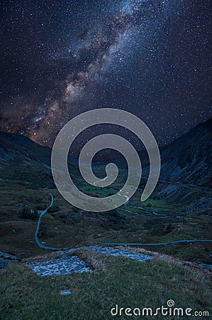 Digital composite Milky Way image of Beautiful dramatic landscape image of Nant Francon valley in Snowdonia Stock Photo