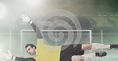 Soccer goalkeeper saving in goal Stock Photo