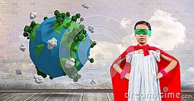 Superhero girl with sky clouds wall and planet earth world Stock Photo