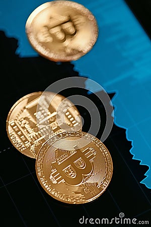 Digital Currency Bitcoin Closeup With Financial Graphics Stock Photo