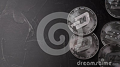 Digital currency physical metal silver dashcoin coin. Stock Photo
