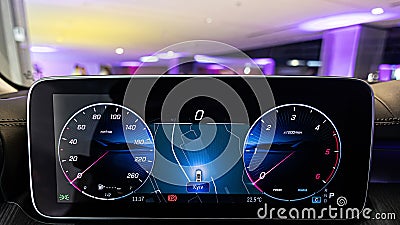Digital dashboard showing the speedometer and tachometer Editorial Stock Photo