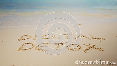 Digital Detox Word Written On Sand Near The Sea Stock Photo