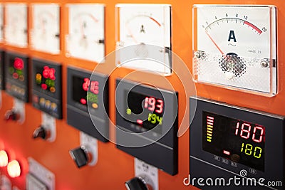 Digital display and analog ammeter of switch gear in power plant Stock Photo