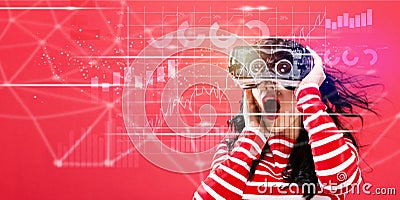 Digital Graph with woman using a virtual reality headset Stock Photo