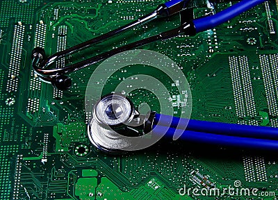 Digital health patient data storage concept - Isolated blue stethoscope on green computer circuit board Stock Photo