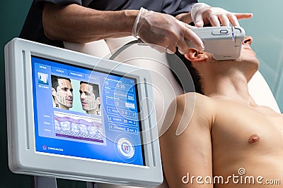Digital hifu treatment interface with patient in background Stock Photo