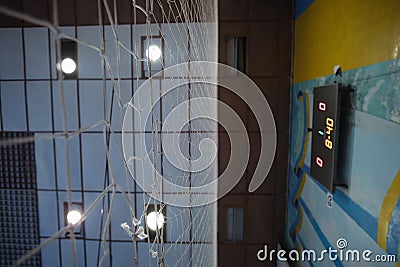 Digital indoor main scoreboard score. Volleyball players are on a field Stock Photo