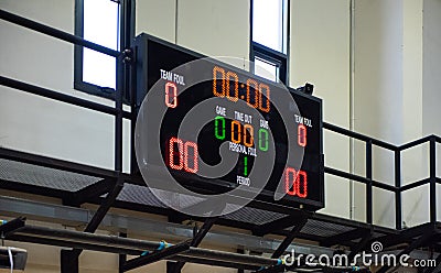 Digital indoor main scoreboard score. Volleyball players are on a field. Stock Photo